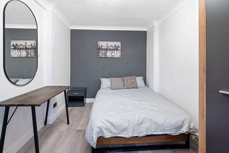 Photo 1: Ground floor bedroom, with toilet just outside