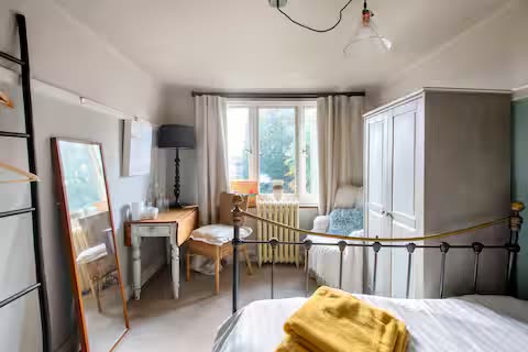 Photo 1: There is a small desk ideal for working