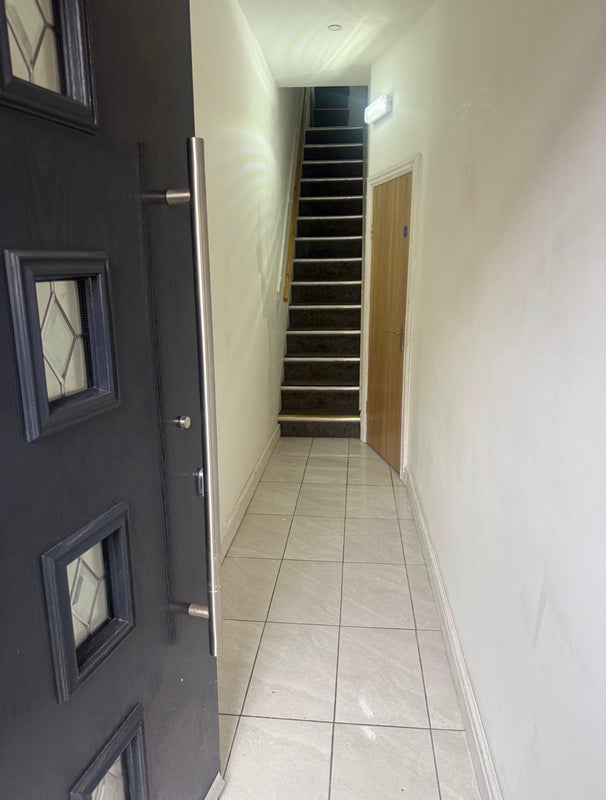 Photo 1: Main Hallway. Ground floor 