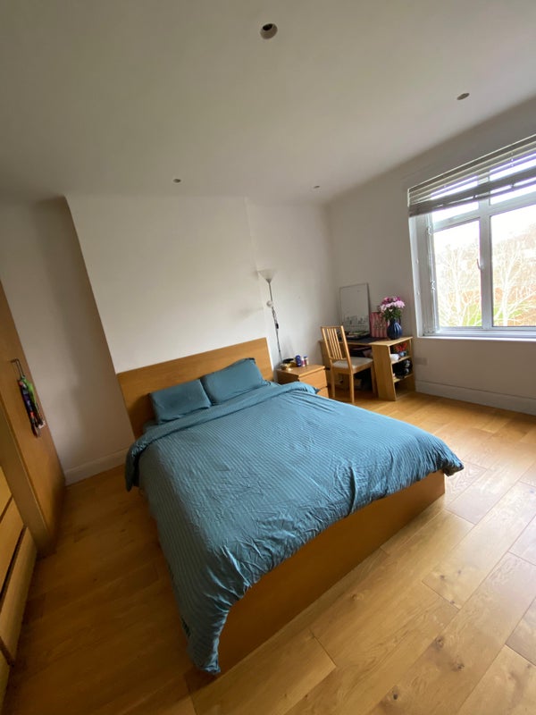 Photo 1: Large bedroom with a double bed, two wardrobes, chest od drawers, and bedside