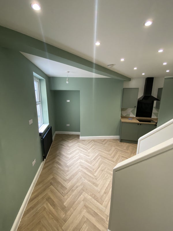 Photo 1: Kitchen/ Living space Apt 6 