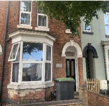 Photo 1: Front of House