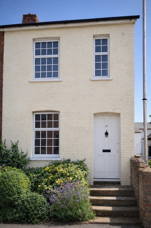 Photo 1: Front of house