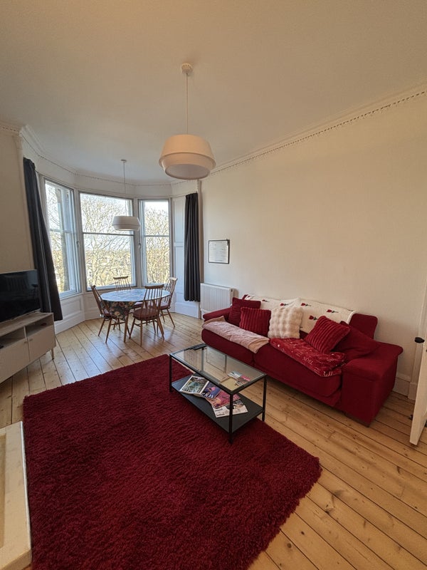 Photo 1: Shared living room 