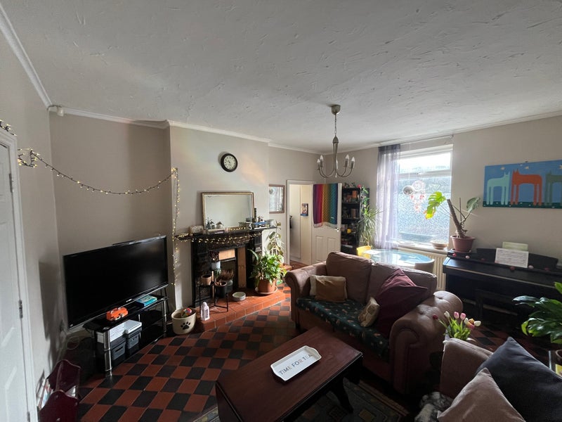 Photo 1: Shared living/dining room