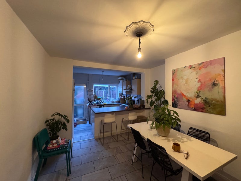 Photo 1: Open plan kitchen + Dining area