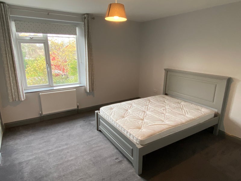 Photo 1: Huge bedroom space with bed and mattress provided