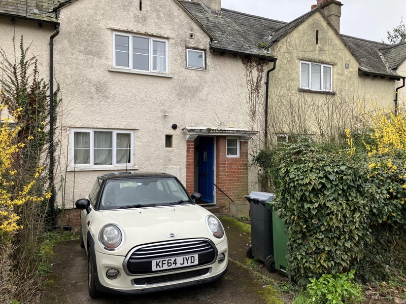 Photo 1: On-street parking available (private road)