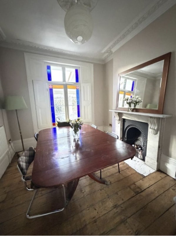 Photo 1: Living room and sunroom behind