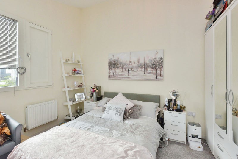 Photo 1: Now the bed is altered to keep spacious