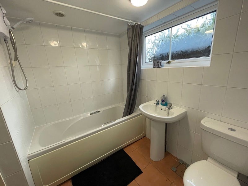 Photo 1: Shared Bathroom