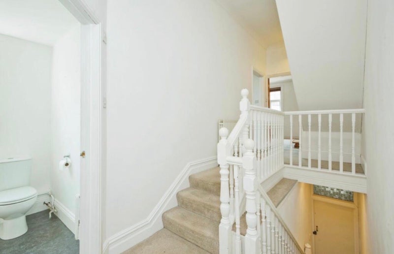 Photo 1: Downstairs landing