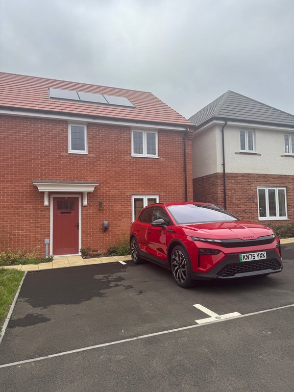 Photo 1: Front of house