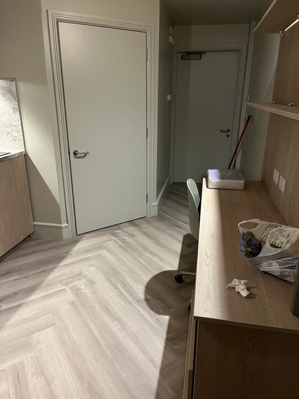 Photo 1: Living space