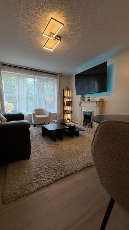 Photo 1: Shared living room