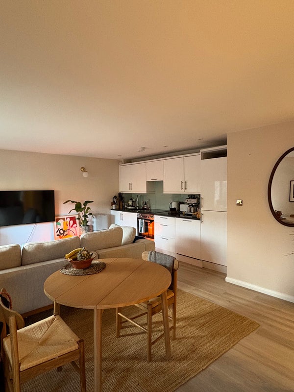 Photo 1: Kitchen / Living Area