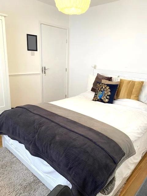 Photo 1: Bedroom one with own private bathroom