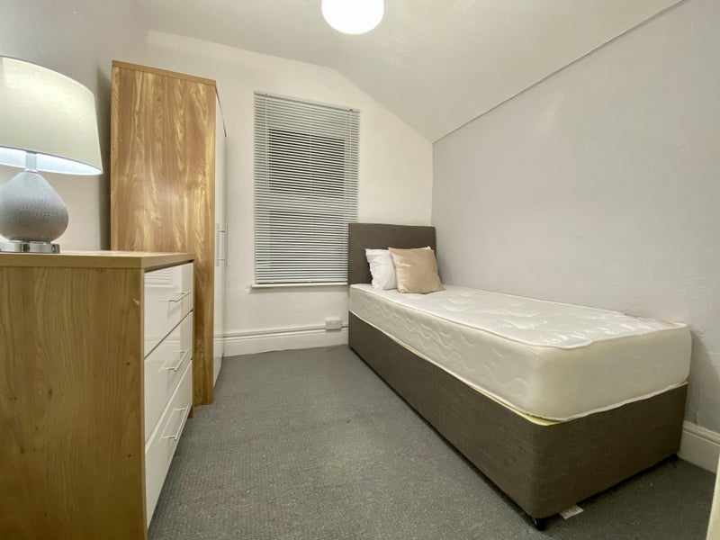 Photo 1: Room 5 with double bed