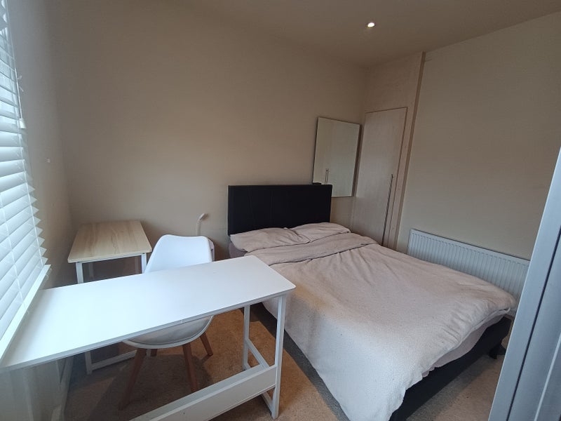 Photo 1: Bedroom and office area