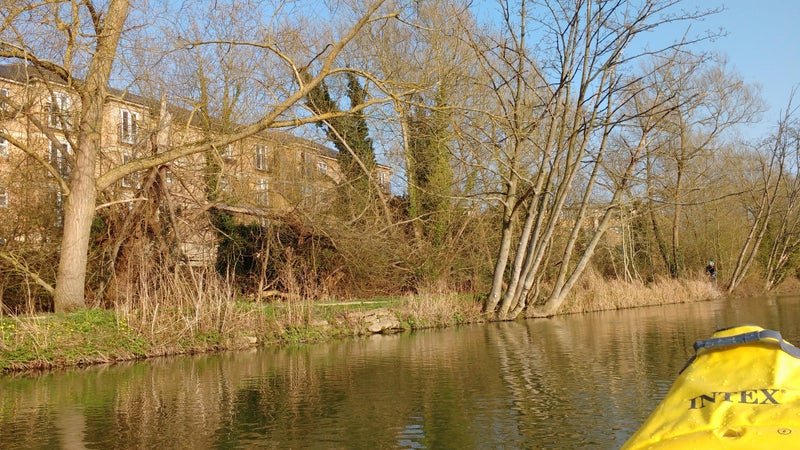 Photo 1: View of our apartment block from the river. Great river path for walking and cycling. Can borrow boa