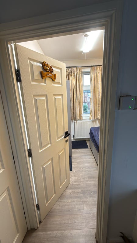 Photo 1: Entrance to the room