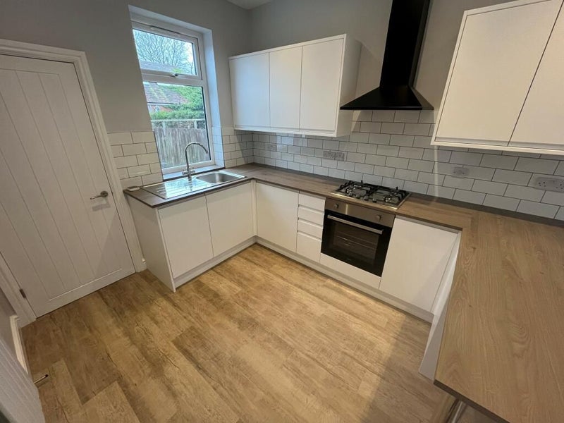 Photo 1: Modern Kitchen Space