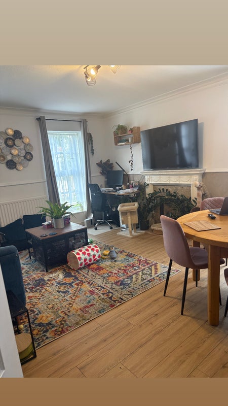 Photo 1: Living room/Dining room