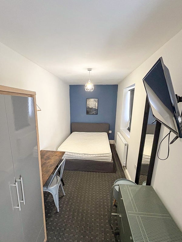 Photo 1: Bedroom 2 - Bed + full room view