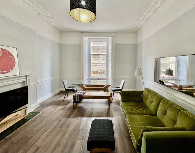 Photo 1: Lovely living room to the front.