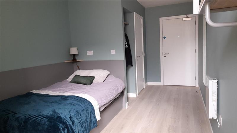 Photo 1: Bedroom 1 (image from the Gilmore Place website)