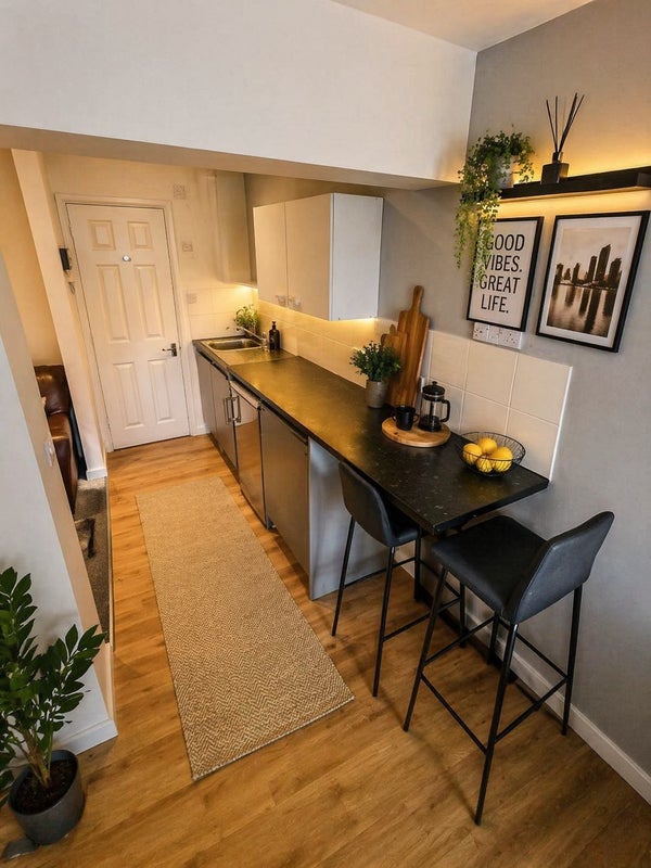 Photo 1: Includes Kitchenette & Breakfast bar (includes appliances)