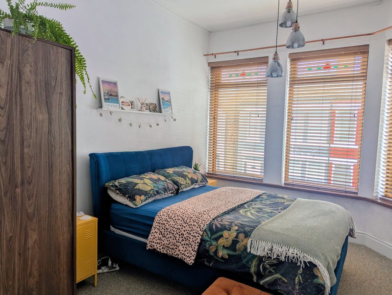Photo 1: Double bedroom with wardrobe and drawers.