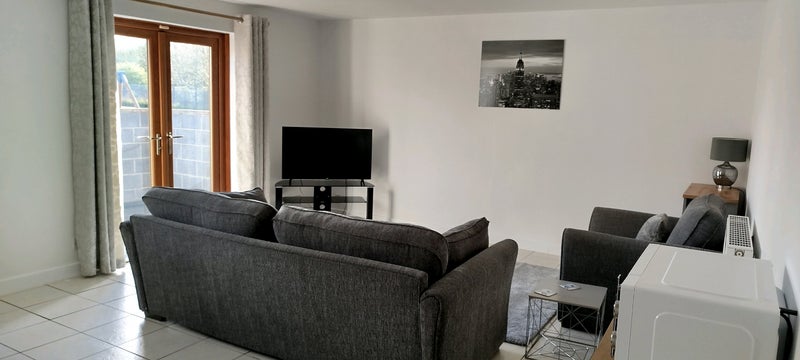 Photo 1: Lounge area (view from entrance hallway)