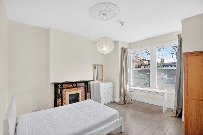 Photo 1: Bedroom with large bay windows