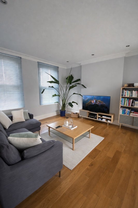 Photo 1: Shared Living Room