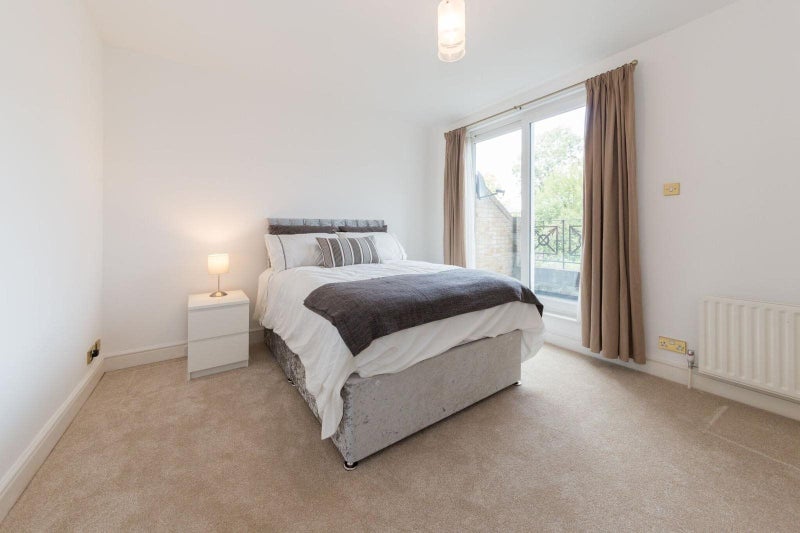 Photo 1: Bedroom, tall ceilings and balcony door leading to private balcony