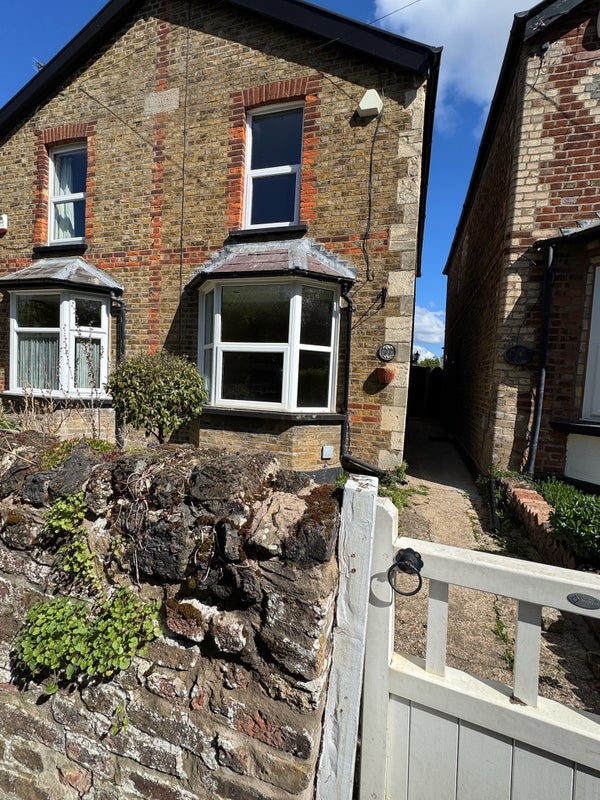 Photo 1: Front of house