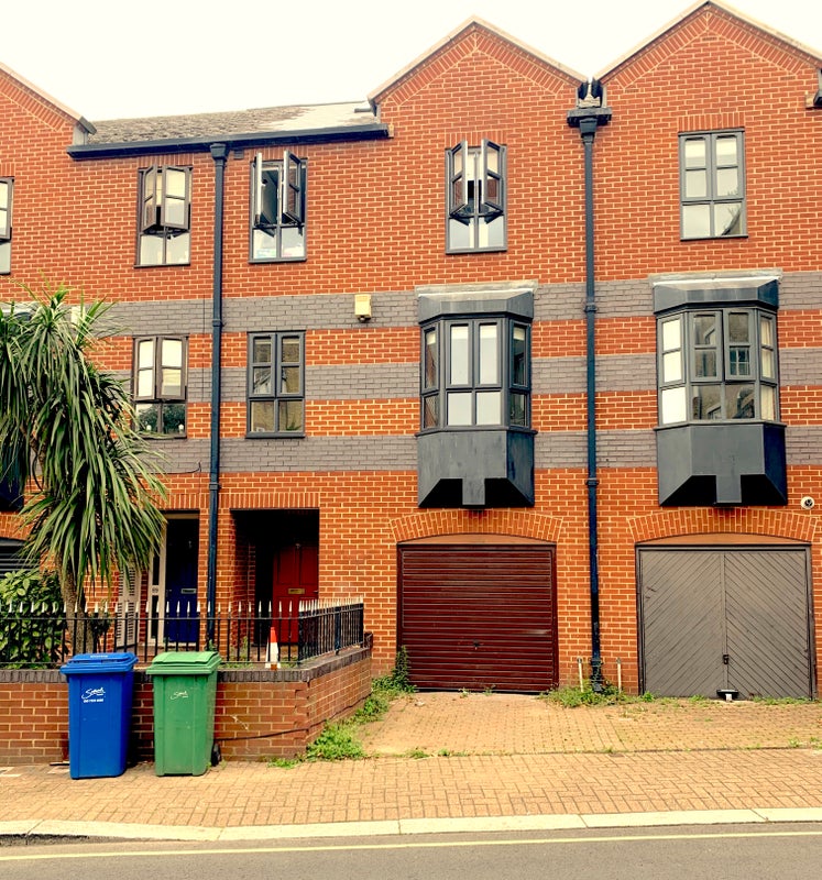 Photo 1: Front of the house (lovely red brick building)
