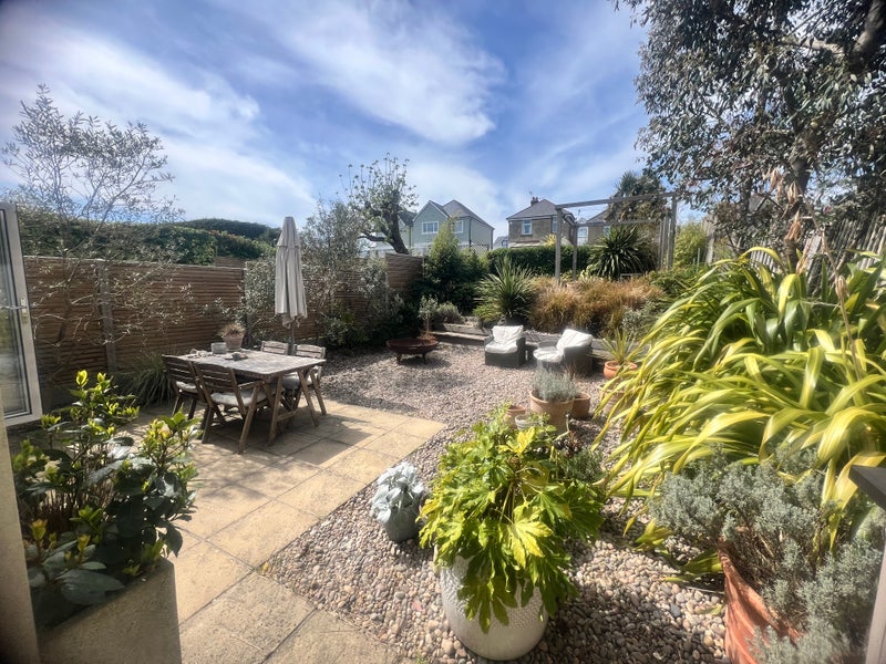 Photo 1: Sunny westerly facing garden 