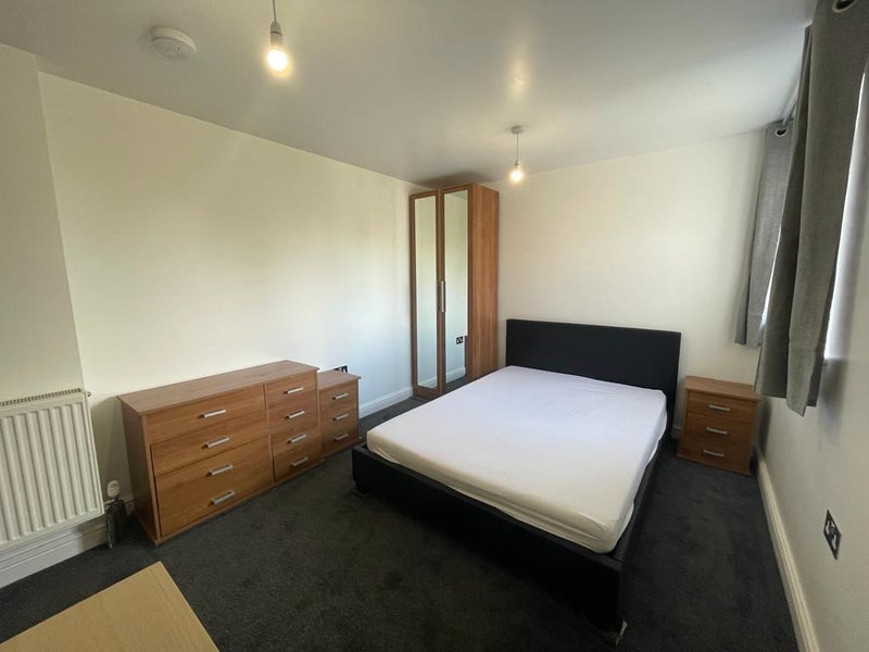 Photo 1: Large Bedroom