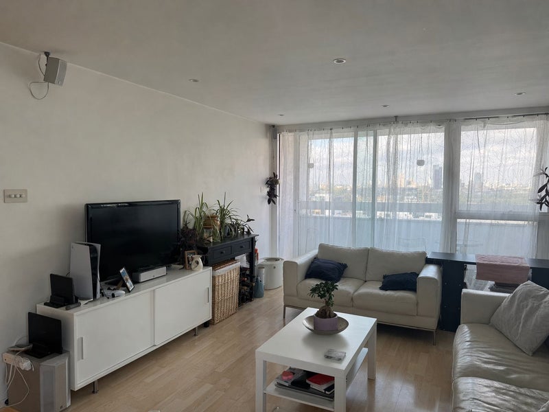 Photo 1: Living room with balcony access