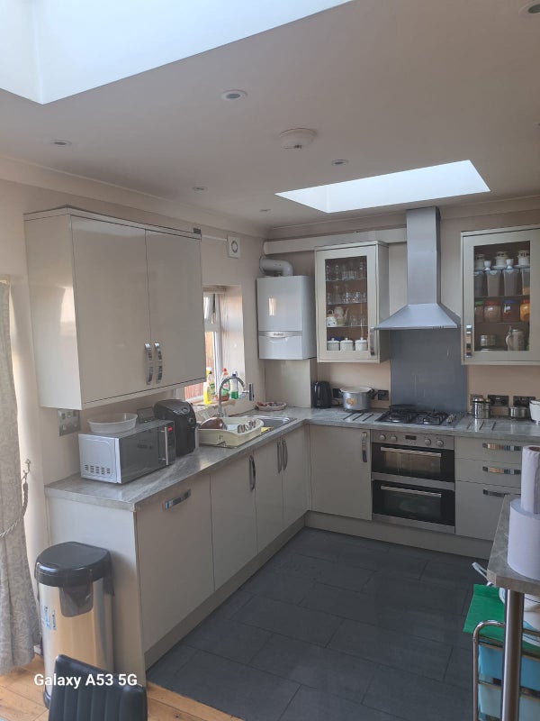 Photo 1: Shared kitchen