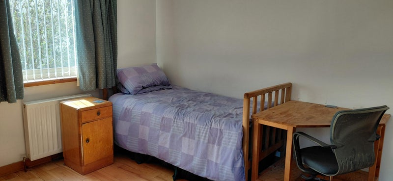 Photo 1: Bed and desk