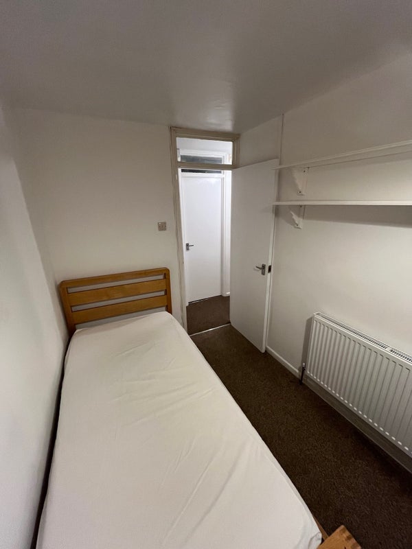 Photo 1: Bedroom from window to door