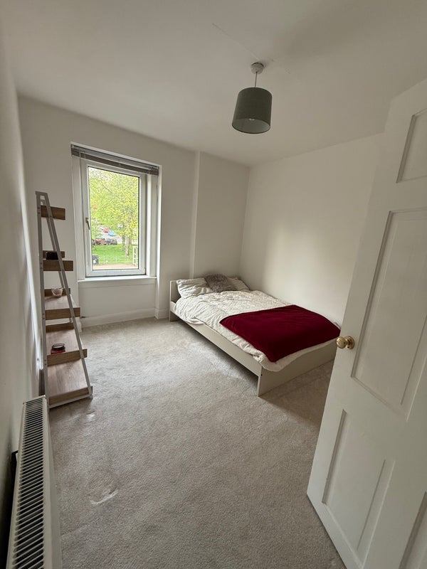 Photo 1: Bedroom ready for roommate (currently looking like)
