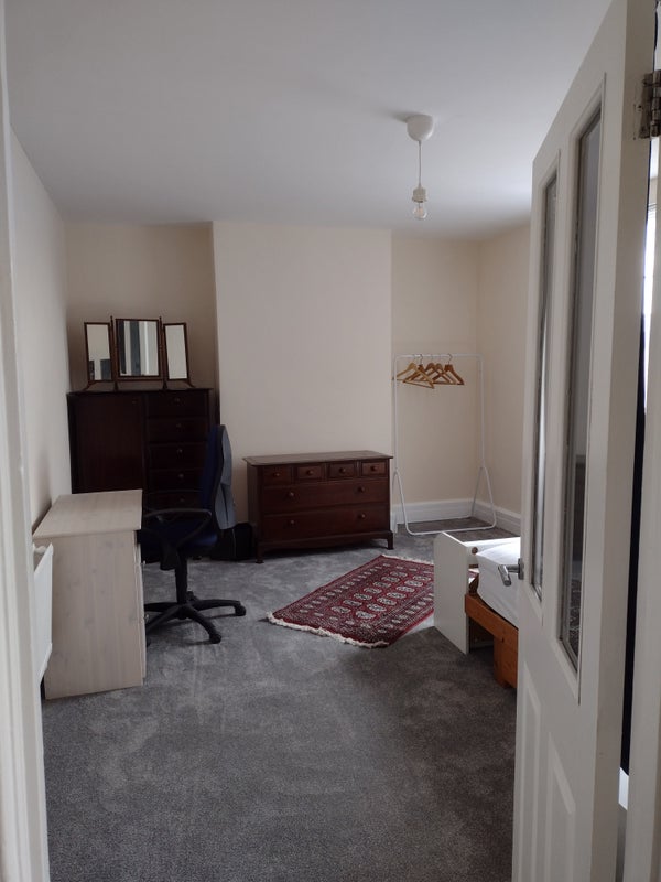 Photo 1: View of room from doorway