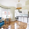 Photo 3: Living room/ kitchen
