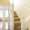 Photo 8: Private entrance to the flat and stairs leading to the bedroom upstairs.