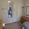 Photo 4: Spacious built in wardrobes 