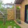 Photo 2: Can enter through the garden gate, key provided as it has a lock.
